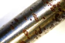 What is pitting corrosion and how does it happen?